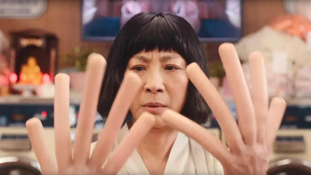 Asian woman with exceptionally long fingers that look fake